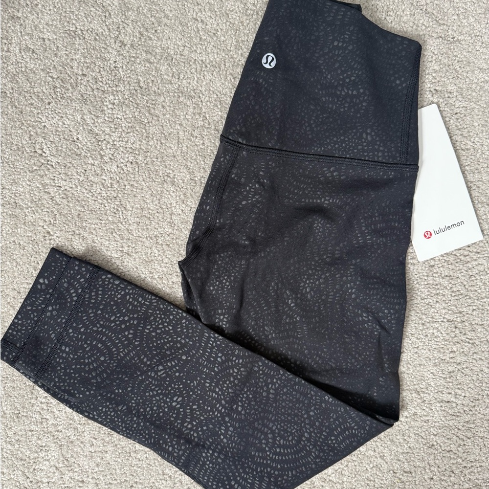 NWT Lululemon Align HR crop 21” black emboss